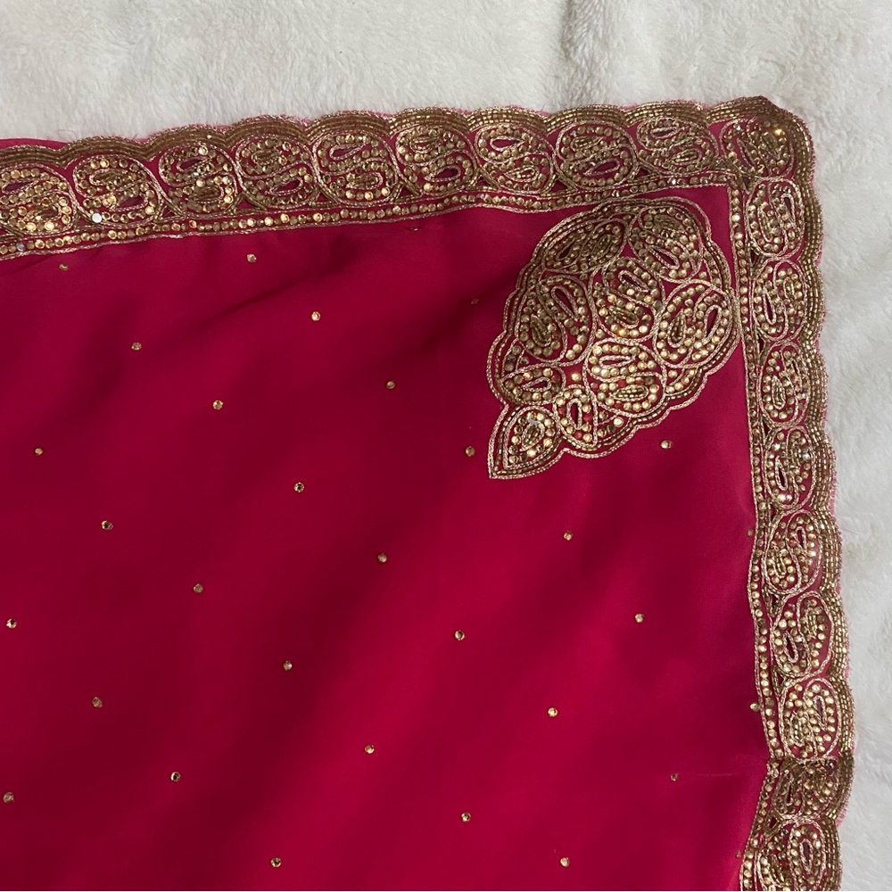 Pink and gold saree